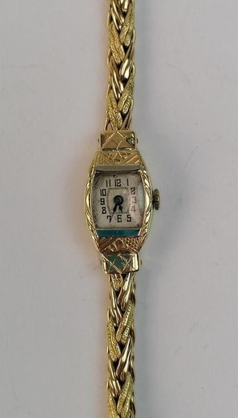 Ladies yellow gold watch with braided bracelet....