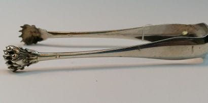 Sugar tongs with silver claws 1st title Minerva...