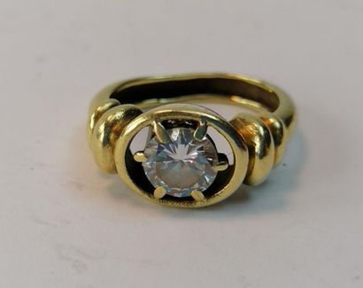Yellow gold ring set with a modern cut diamond...