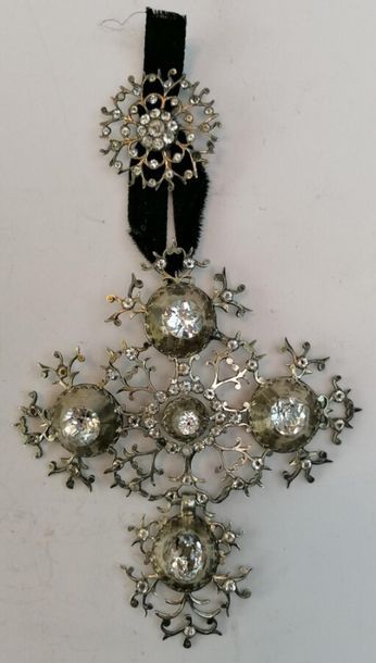 Norman silver cross decorated with rhinestones....