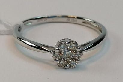 White gold flower ring set with 7 round modern...