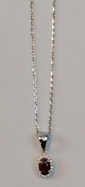 Pendant and its white gold chain link decorated...