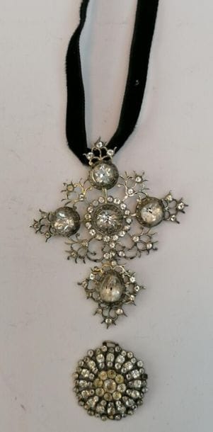 Norman silver cross decorated with rhinestones....