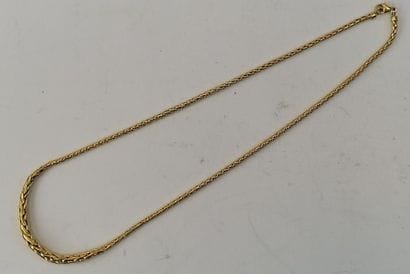 Yellow gold necklace with braided stitches....