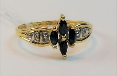 750/1000th yellow gold ring decorated with...