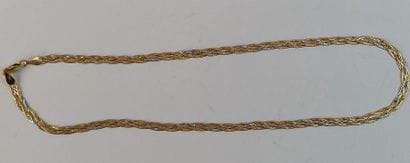 Necklace in yellow gold and silver. 5,88...