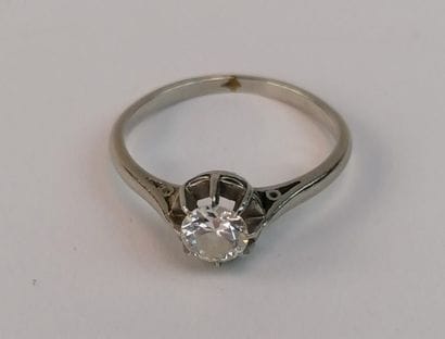 White gold solitaire set with an antique...
