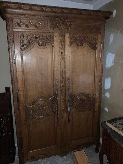 Natural wood cabinet with vine decoration,...