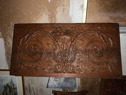 Carved wood panel with scrolling decoration...