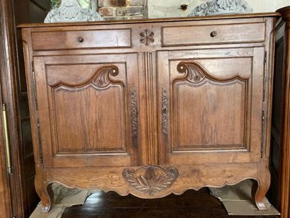 Low sideboard in natural oak opening by 2...