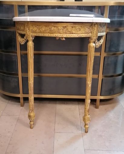 Half moon console in wood and gilded stucco...