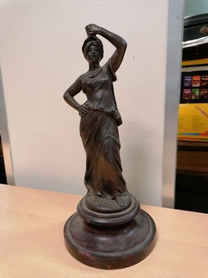 Woman in regula on a pedestal. H 26 cm (missing...