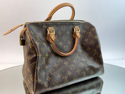 Louis VUITTON- Sac à main, taille 30, avec...
