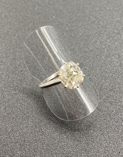 Solitaire cushion cut diamond, platinum setting....