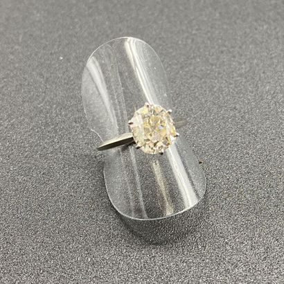 Solitaire cushion cut diamond, platinum setting....