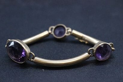 Yellow gold bracelet decorated with 3 important...
