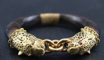 Yellow gold and exotic wood bracelet stylizing...