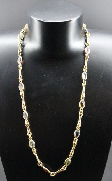 Yellow gold necklace with colored stones....