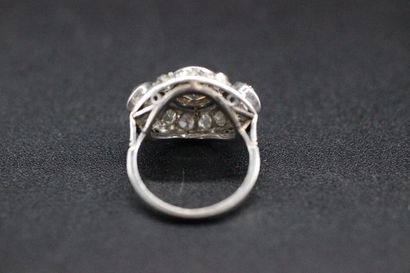 Openwork white gold ring set with a central...