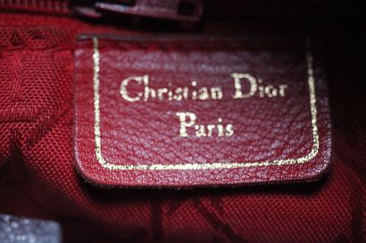 DIOR- Sac à dos en cuir noir, tâches sur...