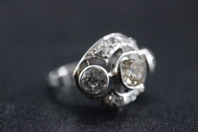 Openwork white gold ring set with a central...