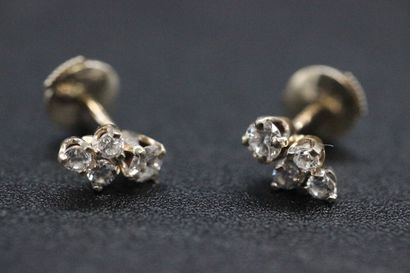 Pair of white gold earrings, each with a...