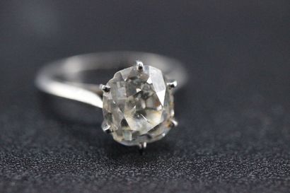 Solitaire cushion cut diamond, platinum setting....
