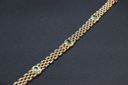 Yellow gold bracelet with 3 emeralds in a...