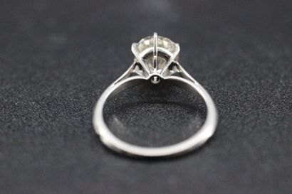 Solitaire cushion cut diamond, platinum setting....