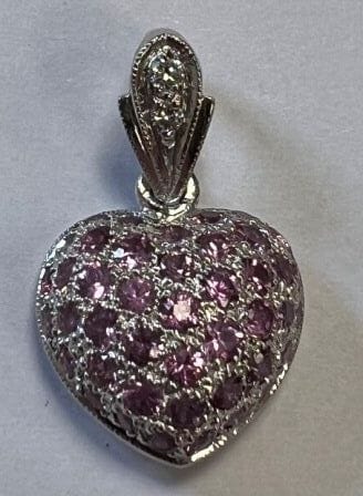 Heart-shaped pendant in white gold 750°/.(18K)...