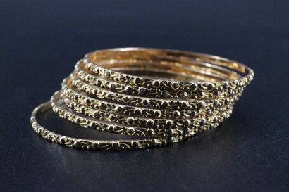 Bracelet semainier en or jaune (7 bracelets)....