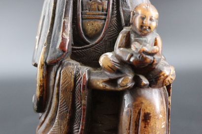 Divinity in hard stone. H 21 cm