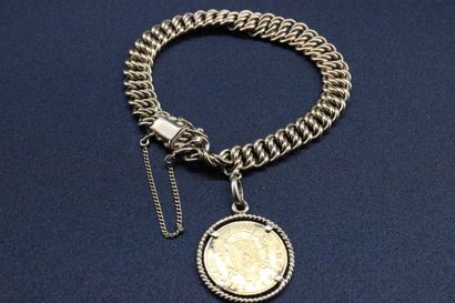 Bracelet en or jaune orné d'une pièce de...