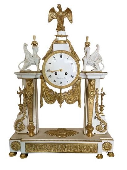 Portico clock in cookie and gilt bronze with...