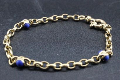 Bracelet en or jaune orné de pierre en lapis...
