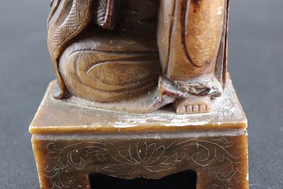Divinity in hard stone. H 21 cm