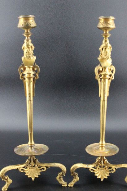 Pair of ormolu candlesticks on tripod bases...