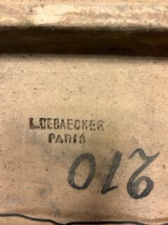 Ceramic group with fleur de lys. Signed L....