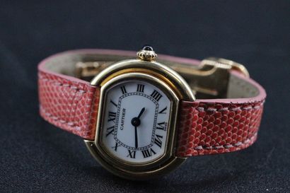 CARTIER- Montre en or jaune modele ELLIPSE...
