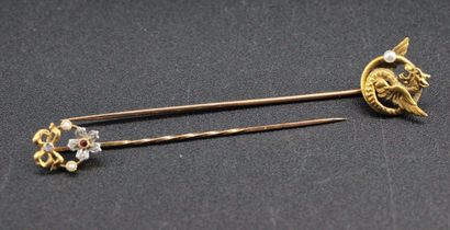 2 yellow gold tie pins set with small stones,...