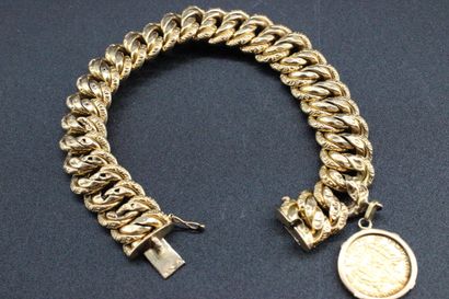 Bracelet en or jaune articulé avec 1 pièce...