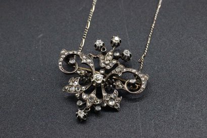 Pendentif et sa chaîne transformable en broche...