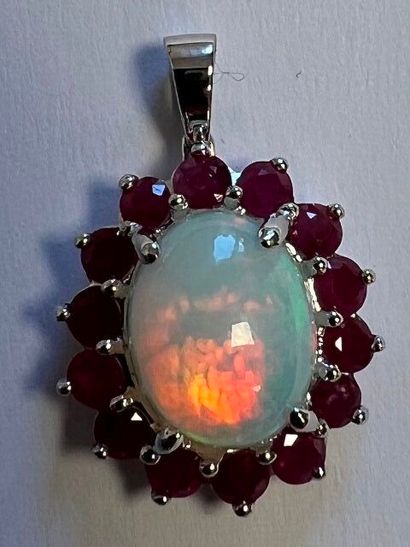 Pendentif en or blanc 750°/.(18K) 3g30 orné...