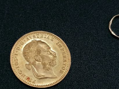 Lot comprising a 1915 Austrian yellow gold...