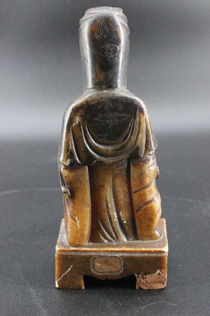 Divinity in hard stone. H 21 cm