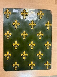 Ceramic group with fleur de lys. Signed L....