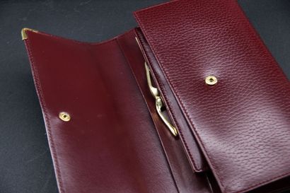 CARTIER - Burgundy leather wallet (in original...
