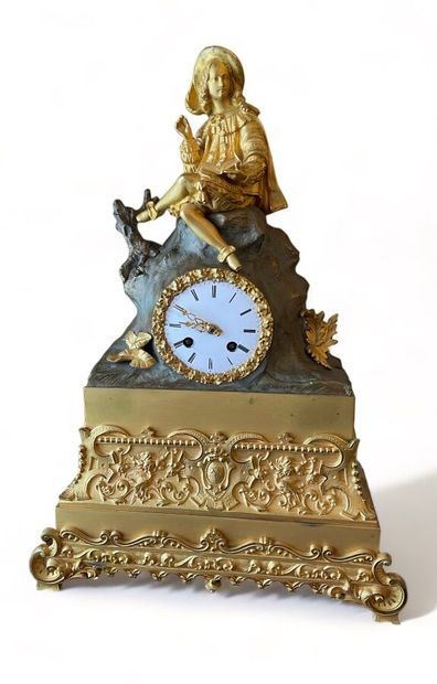 Gilt bronze clock, decorated with a young...