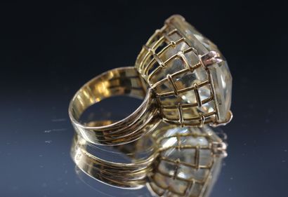18k yellow gold ring set with a large rectangular...