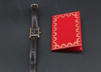 CARTIER - Lady's watch in gold-plated silver....